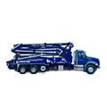 Pompe avec mât de distribution de marque Schwing S 38 SX à louer